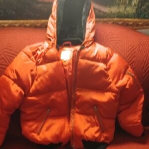 red hot kiss Puffer Jacket with th foux fur lined hood 22 p2p 22inch long